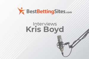 Graphic featuring the BestBettingSites.com logo and the headline ‘Interviews Kris Boyd’, set against a light grey striped background with a studio microphone arm on the right.
