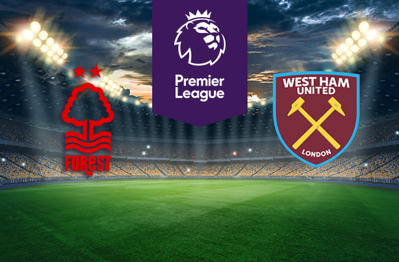 The image shows the logos of two Premier League football clubs, Nottingham Forest and West Ham United, displayed on a football pitch background. The Nottingham Forest logo is on the left side, featuring a stylized tree with flowing lines representing waves beneath it, and the word "Forest" written below in red. The logo also includes two red stars above the tree. The West Ham United logo is on the right side, featuring two crossed hammers on a claret shield with a blue outline, and the text "West Ham United" above the hammers and "London" below. In the centre, there is the Premier League logo, consisting of a lion's head above the text "Premier League." The background depicts a lit football stadium with a dramatic, cloudy sky above, creating an intense and competitive atmosphere.