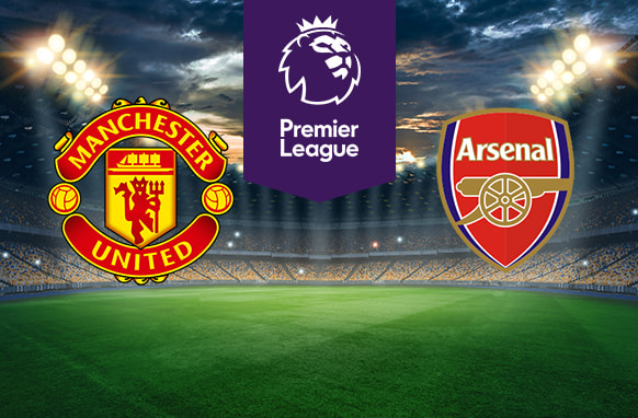 The image shows the logos of two Premier League football clubs, Manchester United and Arsenal, displayed on a football pitch background. The Manchester United logo is on the left side, featuring a red and yellow crest with a ship and a devil holding a trident, along with the text "Manchester United." The Arsenal logo is on the right side, featuring a red shield with a cannon and the text "Arsenal." In the centre, there is the Premier League logo, consisting of a lion's head above the text "Premier League." The background depicts a lit football stadium with a dramatic, cloudy sky above.