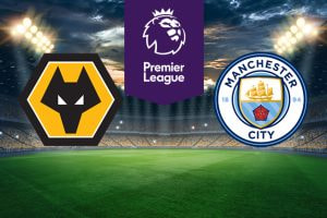 The image shows the logos of two Premier League football clubs, Wolverhampton Wanderers (Wolves) and Manchester City, displayed on a football pitch background. The Wolverhampton Wanderers logo is on the left side, featuring a stylised wolf's head in black and gold. The Manchester City logo is on the right side, featuring a shield with a golden ship, a red rose, and the text