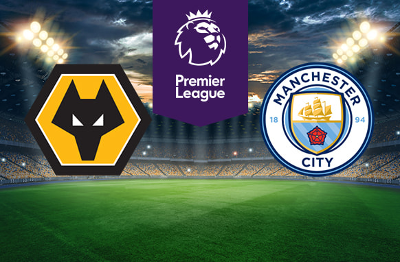 The image shows the logos of two Premier League football clubs, Wolverhampton Wanderers (Wolves) and Manchester City, displayed on a football pitch background. The Wolverhampton Wanderers logo is on the left side, featuring a stylised wolf's head in black and gold. The Manchester City logo is on the right side, featuring a shield with a golden ship, a red rose, and the text "1894" and "Manchester City." In the centre, there is the Premier League logo, consisting of a lion's head above the text "Premier League." The background depicts a lit football stadium with a dramatic, cloudy sky above.