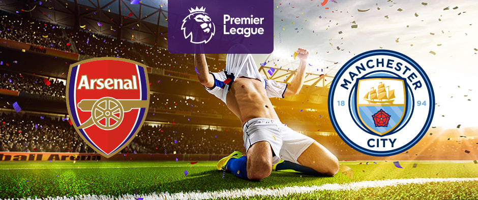 An illuminated football stadium backdrop with confetti in the air. In the centre, a purple Premier League logo. On the left, the Arsenal Football Club emblem. On the right, the Manchester City Football Club emblem. In the foreground, a football player sliding on the grass in celebration.