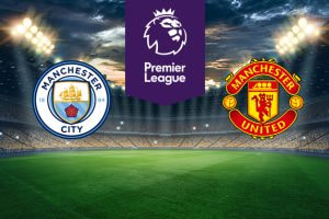 The image shows the logos of two football clubs, Manchester City and Manchester United, displayed on a football pitch. The Manchester City logo is on the left, featuring a circular design with a blue shield that includes a ship and a red rose, and the text