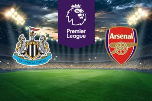 The image shows the logos of two football clubs, Newcastle United and Arsenal, displayed on a football pitch. The Newcastle United logo is on the left, featuring a shield with two seahorses, a stylised castle, and a flag, with the text
