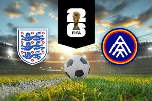 The image shows the logos of two national football associations, The Football Association (England) and the Andorran Football Federation, displayed on a football pitch with a football in the centre. The English logo is on the left, featuring three blue lions on a shield with red roses. The Andorran logo is on the right, featuring a blue and red circular design with intersecting lines. In the centre above the football is the FIFA logo, which includes the FIFA World Cup Trophy and "FIFA" below it on a black background. The background depicts a stadium with dramatic sky lighting, creating a dynamic and intense atmosphere.