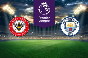The image shows the logos of two football clubs, Brentford and Manchester City, displayed on a football pitch. The Brentford logo is on the left, featuring a circle with a bee in the centre and the text "BRENTFORD FOOTBALL CLUB" along the top and bottom, with the years "18" and "89" on either side. The Manchester City logo is on the right, featuring a circle with a ship in the centre and the text "MANCHESTER CITY" around the top and bottom, with the years "18" and "94" on either side. In the centre above the pitch is the Premier League logo, which includes a lion's head and the text "Premier League" below it on a purple background. The background depicts a stadium with dramatic lighting, creating an intense and vibrant atmosphere.