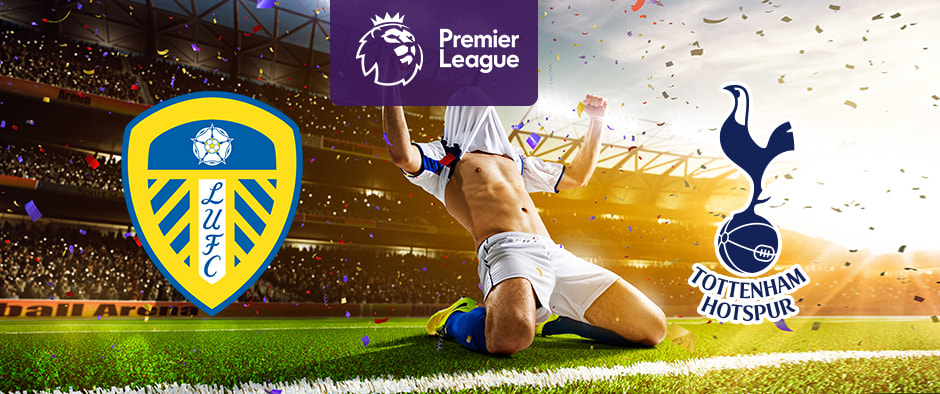 The image shows the logos of two football clubs, Leeds United and Tottenham Hotspur, displayed in front of a football player celebrating by sliding on the pitch. The Leeds United logo is on the left, featuring a yellow and blue shield with a white rose at the top and the letters "LUFC" vertically aligned. The Tottenham Hotspur logo is on the right, featuring a cockerel standing on a football, with the text "Tottenham Hotspur" below it. In the centre above the celebrating player is the Premier League logo, which includes a lion's head and the text "Premier League" below it on a purple background. The background depicts a stadium filled with cheering fans and confetti, creating a dynamic and exhilarating atmosphere.