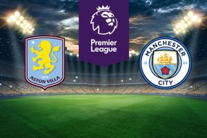 The image features two Premier League football team logos on a football pitch. On the left is Aston Villa's logo, which features a yellow lion standing on its hind legs with a star above it. The logo includes the club's name and the year of establishment (1874) on a claret and blue shield-shaped badge. On the right is Manchester City's logo, displaying a circular crest with a ship above a red rose, the club's name, and the year 1894 (when the club was founded). Above the logos in the centre is the Premier League logo with a stylised lion's head and the words 