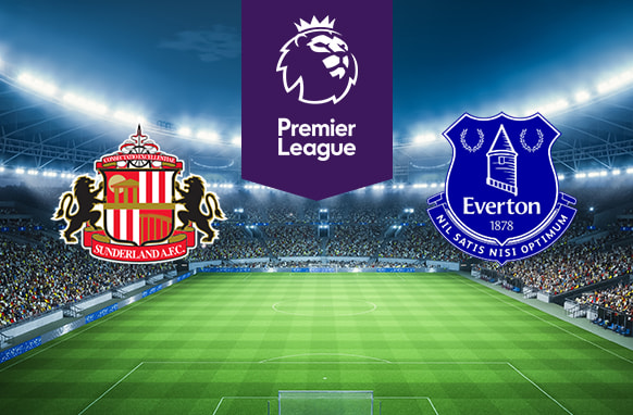 The image features the logos of two Premier League football teams. On the left is Sunderland A.F.C.'s logo with a crest and two lions. On the right is Everton's logo with a tower and the year 1878. Above the logos is the Premier League logo with a lion's head and "Premier League" on a purple background. The background shows a brightly lit stadium filled with spectators, creating an atmosphere of excitement and anticipation.
