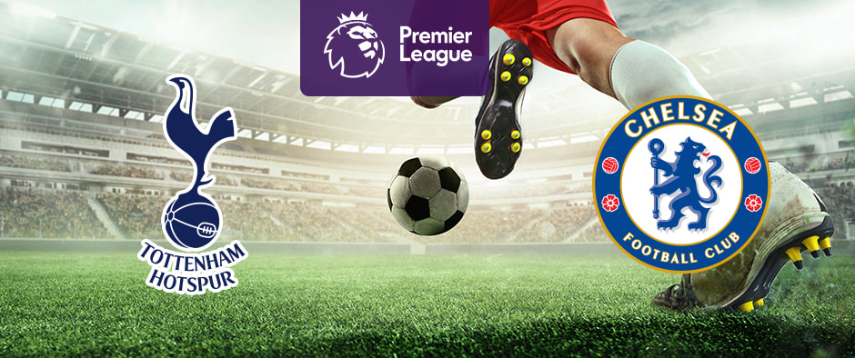 The image features the logos of two Premier League football teams. On the left is Tottenham Hotspur's logo, which features a cockerel standing on a football with the club's name below it. On the right is Chelsea's logo, which shows a circular crest with a lion holding a staff in the centre, surrounded by symbols including roses and the club's name, "Chelsea Football Club." Above the logos in the centre is the Premier League logo with a stylised lion's head and the words "Premier League" on a purple background. In the background, there is a football stadium filled with spectators. In the centre of the image, a football is being kicked by a player in red shorts, adding dynamism and excitement to the scene.