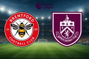 The image shows the logos of two football clubs that are part of a Premier League match. On the left is the logo of Brentford Football Club, featuring a bee at the centre, surrounded by the club’s name and the established year, 1889, in a red and white circular design. On the right is the logo of Burnley Football Club, which is a shield in purple and white depicting a stork and a traditional lion design along with the club’s name. Above both logos is the Premier League emblem, featuring a crowned lion's head and the text 