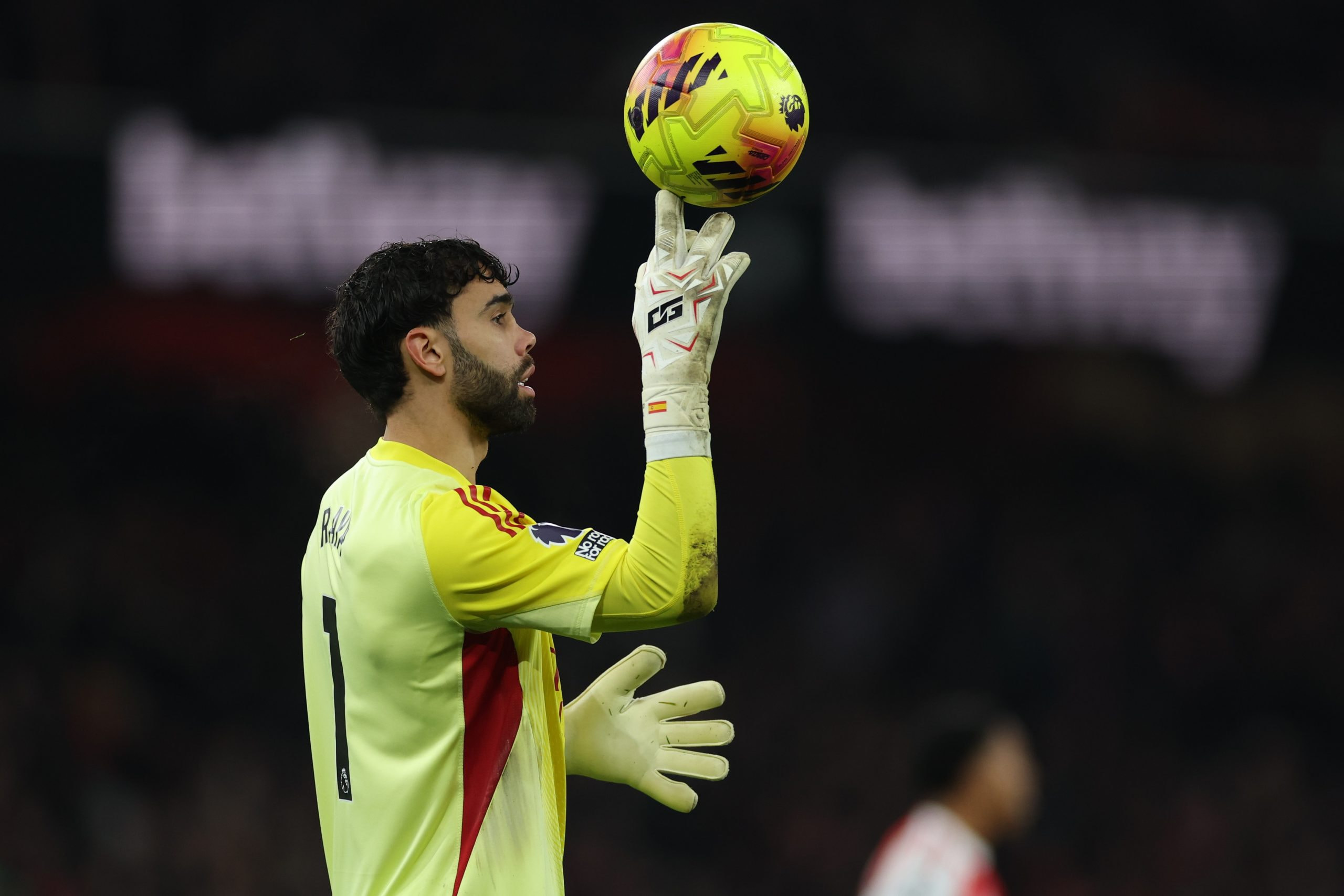 Arsenal's goalkeeper David Raya balances the ball during the English Premier League soccer match between Arsenal and Liverpool in London, Thursday, Jan. 8, 2026. (AP Photo/Ian Walton)